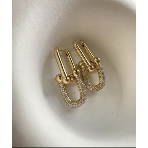 Tiff Gold Küpe Modelimiz Tiff Gold Küpe Modelimiz